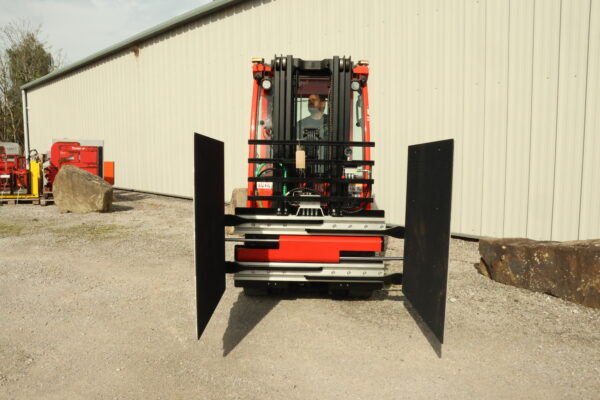 the longhe carton clamp is open and attached to the read abbey forklift truck