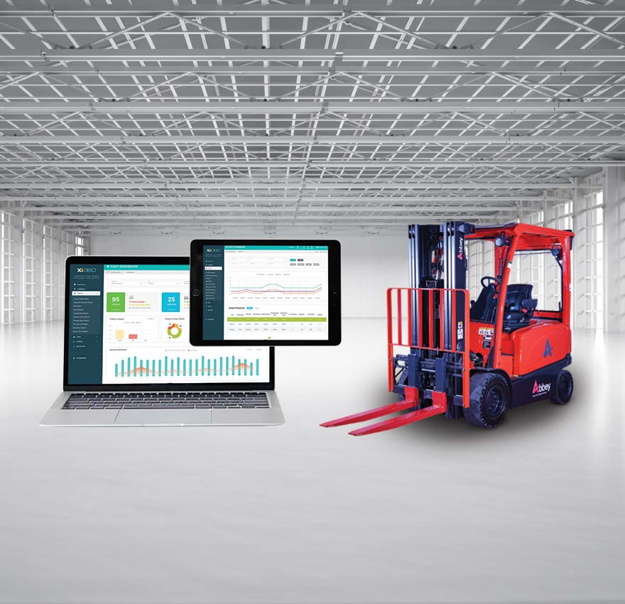 an red abbey forklift truck can be seen in an empty warehouse alongside an enlarged laptop and tablet displaying xq360 forklift telematics system dashboard