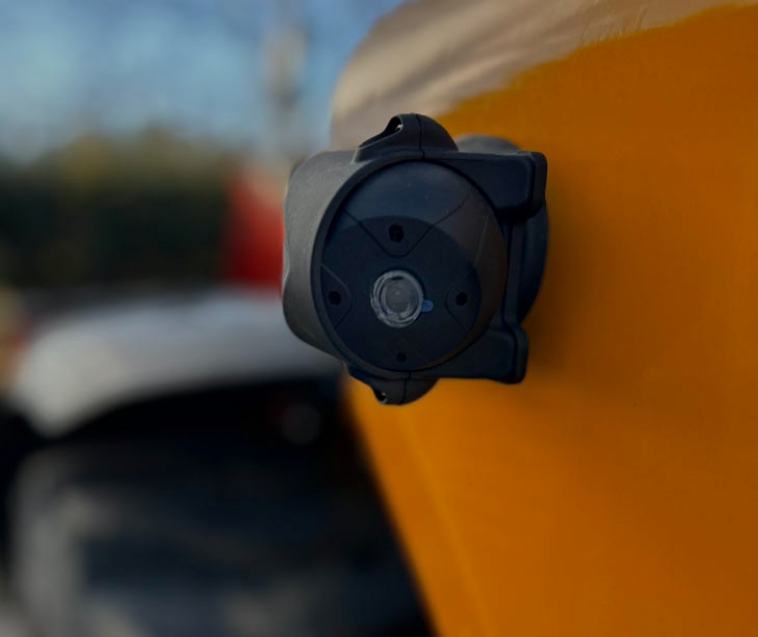 a safety shield camera is attached to a yellow forktruck