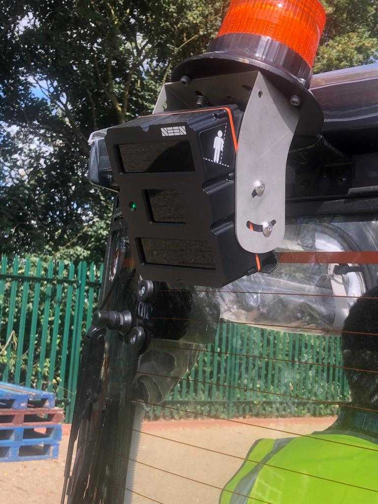 a black seen safety sensor at the back of a forktruck